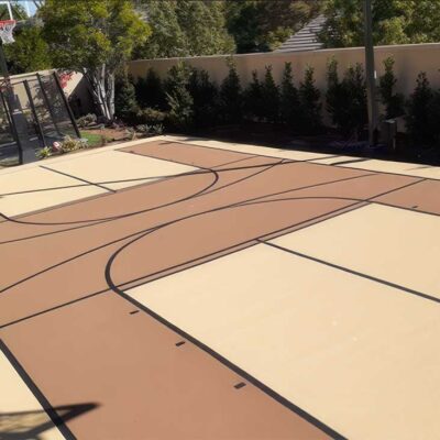 The Photo Shows A Concrete Slab That Ferandell Tennis Courts Converted Into A Multi-game Court For Basketball And Pickleball.