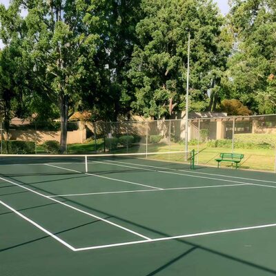 Tennis Court Repair And Resurfacing For Mission Hills High School Was Provided By Ferandell Tennis Court Using Dark Green For The Court And The Surround With White Striping.