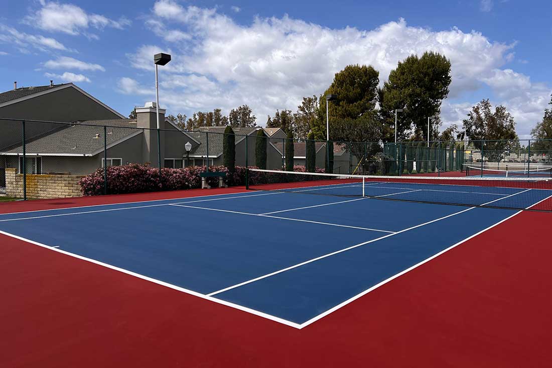 tennis court construction with a beautiful patriot color palette built in irvine grove, irvine california by ferandell tennis courts.
