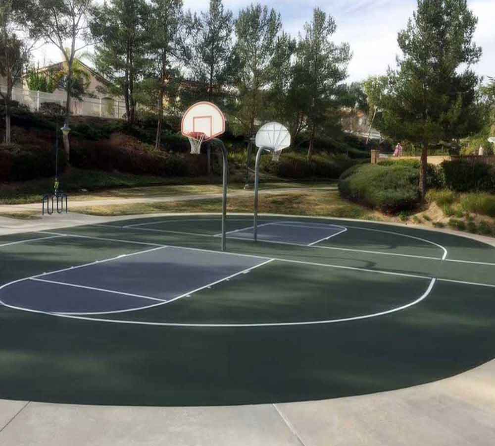 photo shows 2 gorgeous round basketball courts back-to-back.