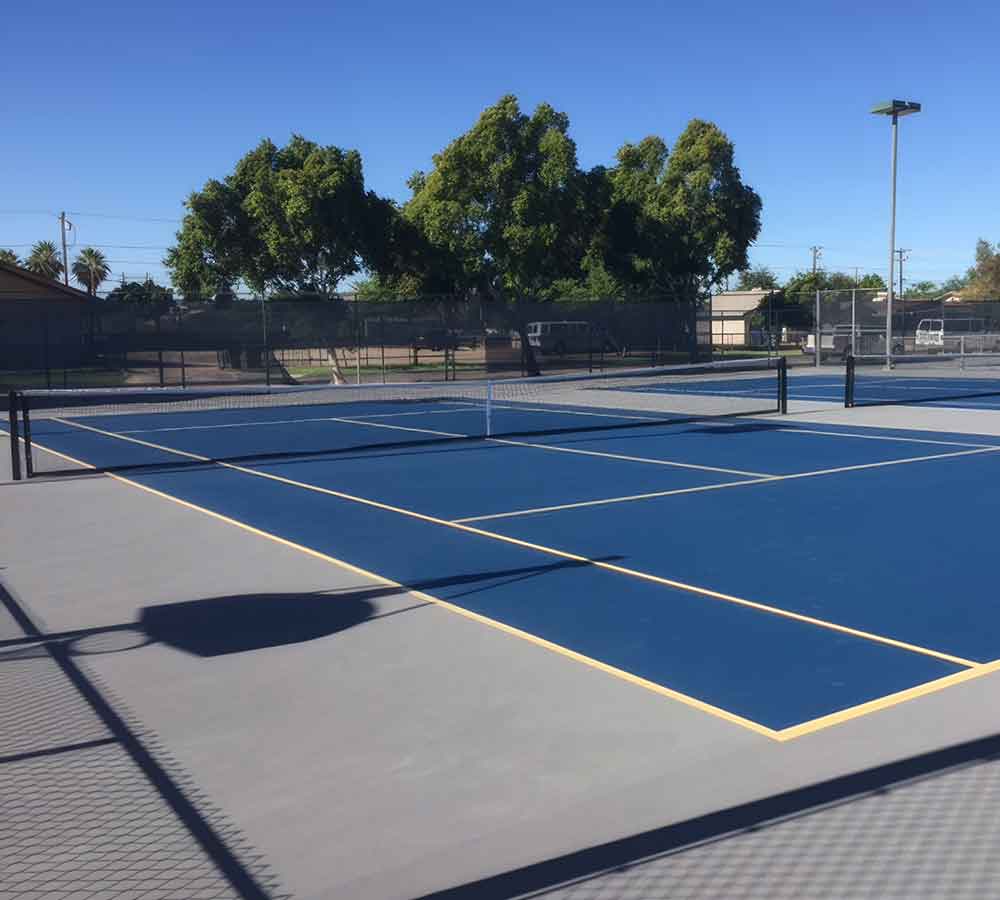 photo shows the tennis courts built for brawley high school by ferandell tennis courts.
